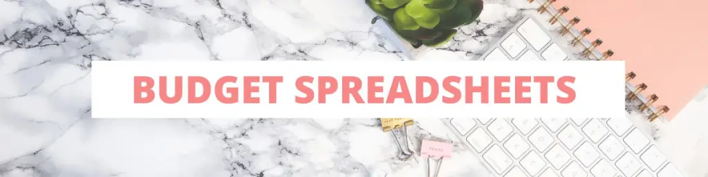 Budget Spreadsheets header Budget Spreadsheets written in large type over marble desktop
